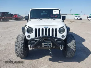 2014 Jeep Wrangler Unlimited Rubicon with VIN 1C4BJWFG1EL167423, listed as a IAAI auction lot 41861109 with 104,669 mi miles. Bid and sale history available at carsss.com. Image 6.
