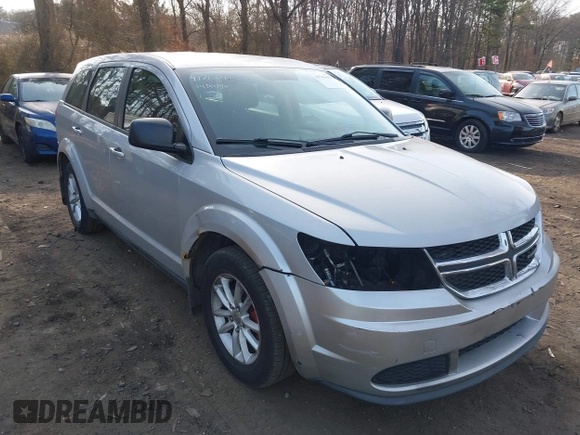 2014 Dodge Journey SE with VIN 3C4PDCAB1ET247218, listed as a IAAI auction lot 41760408 with 148,591 mi miles and . Bid and sale history available at carsss.com. Image 6.
