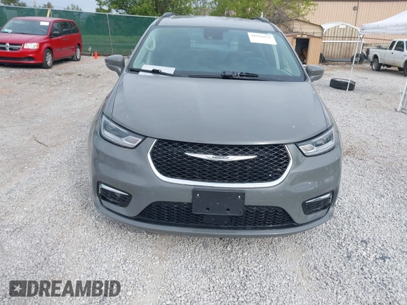 2022 Chrysler Pacifica Touring L with VIN 2C4RC1BG7NR168519, listed as a IAAI auction lot 41928929 with 55,814 mi miles and . Bid and sale history available at DreamBid. Image 12.
