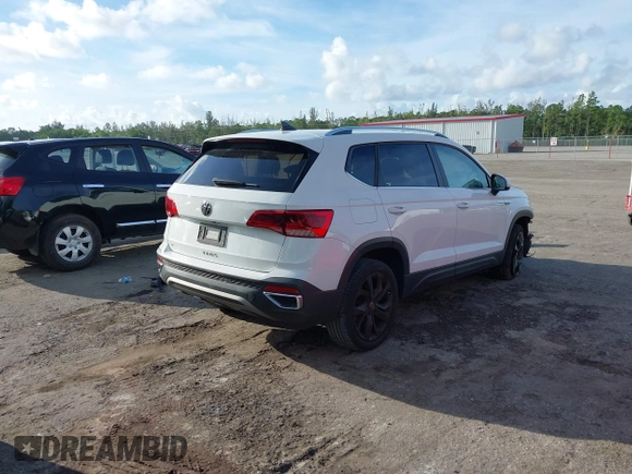 2022 Volkswagen Taos SE z VIN 3VVTX7B2XNM025588, wystawiony jako IAAI lot #39670650 z przebiegiem 45 817 mil mil oraz . Historia ofert i sprzedaży dostępna na DreamBid. Obrazek 4.