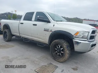 2014 Ram 2500 Tradesman z VIN 3C6UR5HL9EG244694, wystawiony jako IAAI lot #42014853 z przebiegiem 234 693 mil mil oraz . Historia ofert i sprzedaży dostępna na DreamBid. Obrazek 1.