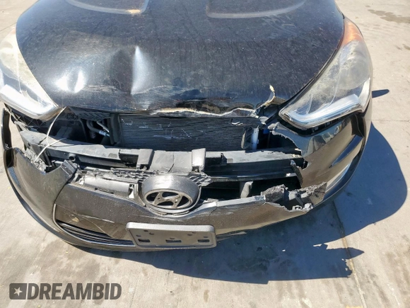 2016 Hyundai Veloster z VIN KMHTC6AD0GU266707, wystawiony jako Copart lot #57617395 z przebiegiem 70 677 mil mil oraz Szkoda całkowita • Salvage title. Historia ofert i sprzedaży dostępna na DreamBid. Obrazek 11.