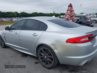 2015 Jaguar XF V6 Portfolio with VIN SAJWA0F79F8U77985, listed as a IAAI auction lot 41386030 with 81,335 mi miles. Bid and sale history available at carsss.com. Image 6.