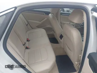 2014 Volkswagen Passat SE z VIN 1VWBT7A33EC032459, wystawiony jako IAAI lot #42259640 z przebiegiem 168 706 mil mil oraz . Historia ofert i sprzedaży dostępna na DreamBid. Obrazek 8.
