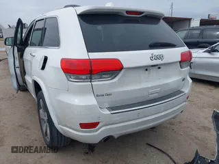 2014 Jeep Grand Cherokee Overland with VIN 1C4RJECG3EC266659, listed as a IAAI auction lot 41363419 with 142,896 mi miles. Bid and sale history available at carsss.com. Image 3.