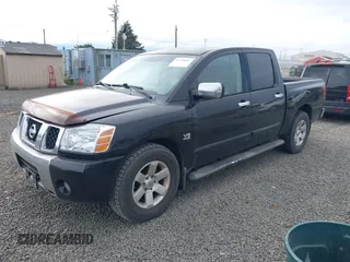 2004 Nissan Titan LE with VIN 1N6AA07A24N549589, listed as a IAAI auction lot 41750807 with 218,118 mi miles and . Bid and sale history available at DreamBid. Image 2.