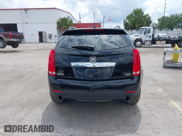 2015 Cadillac SRX Performance Collection z VIN 3GYFNCE31FS597798, wystawiony jako IAAI lot #42387793 z przebiegiem 159 986 mil mil oraz . Historia ofert i sprzedaży dostępna na DreamBid. Obrazek 16.