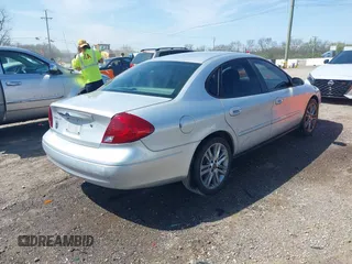 2003 Ford Taurus SE Standard with VIN 1FAFP53U83A166112, listed as a IAAI auction lot 41945480 with 173,593 mi miles. Bid and sale history available at carsss.com. Image 4.