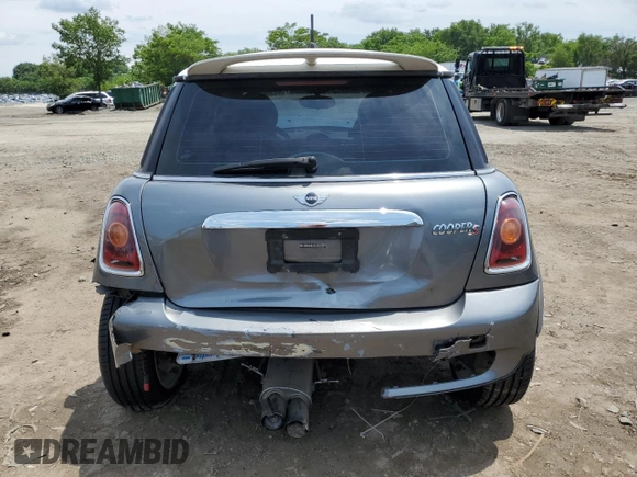 2007 MINI Hardtop S with VIN WMWMF73577TT84087, listed as a Copart auction lot 60208895 with 76,248 mi miles and Salvage title. Bid and sale history available at DreamBid. Image 6.