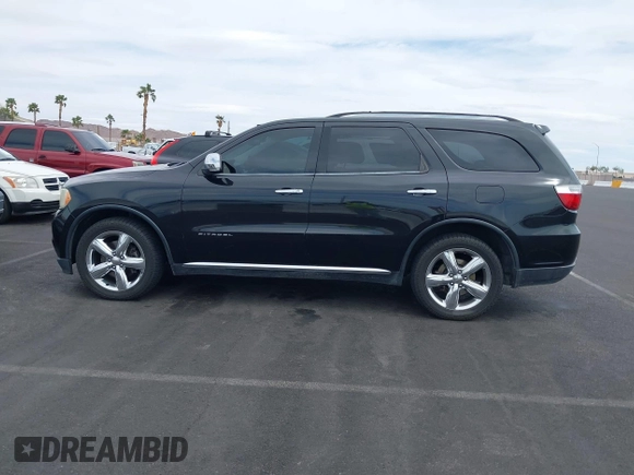 2012 Dodge Durango Citadel with VIN 1C4SDHET9CC229729, listed as a IAAI auction lot 41893819 with 167,519 mi miles and . Bid and sale history available at DreamBid. Image 14.