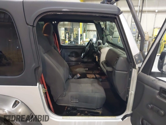 2003 Jeep Wrangler Rubicon with VIN 1J4FA69S13P375142, listed as a IAAI auction lot 41709647 with 125,443 mi miles and . Bid and sale history available at DreamBid. Image 8.