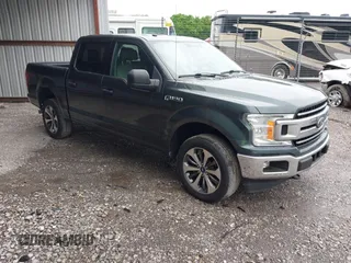 2018 Ford F-150 XL with VIN 1FTEW1EG4JKE17790, listed as a IAAI auction lot 42128519 with 153,740 mi miles. Bid and sale history available at carsss.com. Image 1.