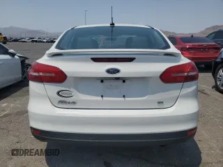 2015 Ford Focus SE with VIN 1FADP3F23FL319168, listed as a Copart auction lot 64411645 with 213,852 mi miles and Clean title. Bid and sale history available at DreamBid. Image 6.