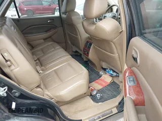 2004 Acura MDX Touring Pkg with VIN 2HNYD18694H551917, listed as a IAAI auction lot 42130100 with 207,699 mi miles. Bid and sale history available at carsss.com. Image 8.
