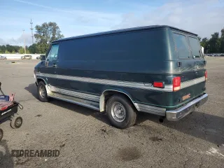 1991 GMC Vandura z VIN 1GDEG25K6M7504729, wystawiony jako Copart lot #71146614 z przebiegiem 181 800 mil mil oraz Tytuł czysty. Historia ofert i sprzedaży dostępna na DreamBid. Obrazek 2.