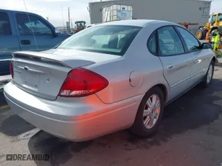 2004 Ford Taurus SEL with VIN 1FAFP56SX4A156094, listed as a IAAI auction lot 41688747 with 126,339 mi miles. Bid and sale history available at carsss.com. Image 4.
