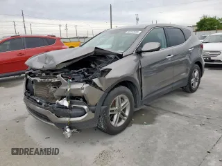 2018 Hyundai Santa Fe 2.4L z VIN 5NMZTDLBXJH052580, wystawiony jako Copart lot #60232505 z przebiegiem Nie podano mil oraz Szkoda całkowita • Salvage title. Historia ofert i sprzedaży dostępna na DreamBid. Obrazek 1.