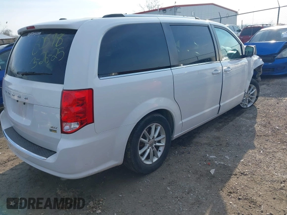 2019 Dodge Grand Caravan SXT with VIN 2C4RDGCG5KR758521, listed as a IAAI auction lot 41902760 with 133,994 mi miles and . Bid and sale history available at DreamBid. Image 4.