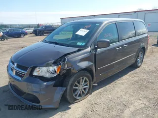 2015 Dodge Grand Caravan SE with VIN 2C4RDGBG2FR684367, listed as a IAAI auction lot 42167621 with 216,628 mi miles and . Bid and sale history available at DreamBid. Image 2.