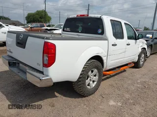 2011 Nissan Frontier SL with VIN 1N6AD0ERXBC424218, listed as a IAAI auction lot 42451520 with 205,866 mi miles and . Bid and sale history available at DreamBid. Image 4.