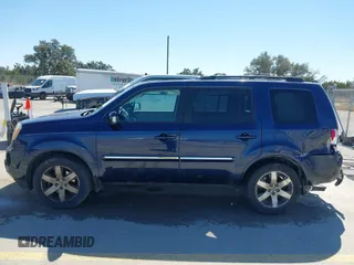 2013 Honda Pilot Touring with VIN 5FNYF3H94DB018384, listed as a IAAI auction lot 41672767 with 188,922 mi miles and . Bid and sale history available at DreamBid. Image 14.