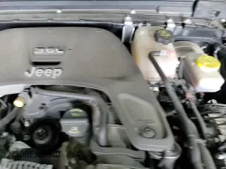 2021 Jeep Wrangler Sport S with VIN 1C4GJXAG6MW621682, listed as a Copart auction lot 67780175 with 32,831 mi miles and Salvage title. Bid and sale history available at DreamBid. Image 16.