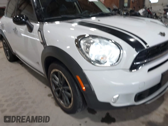 2016 MINI Countryman S with VIN WMWZC5C57GWU20085, listed as a IAAI auction lot 42403406 with 90,592 mi miles and . Bid and sale history available at DreamBid. Image 20.