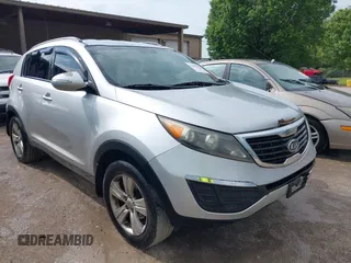 2011 Kia Sportage LX with VIN KNDPB3A23B7053943, listed as a IAAI auction lot 42063941 with 234,364 mi miles and . Bid and sale history available at carsss.com. Image 1.