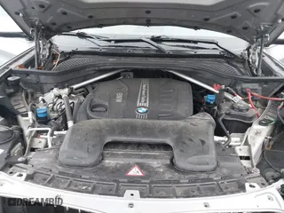 2015 BMW X5 xDrive35d with VIN 5UXKS4C51F0N06221, listed as a IAAI auction lot 41568976 with 162,442 mi miles. Bid and sale history available at carsss.com. Image 10.