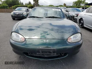 1999 Mazda MX-5 Miata z VIN JM1NB3539X0107918, wystawiony jako Copart lot #56693795 z przebiegiem 42 518 mil mil oraz Czysty tytuł • Clean title. Historia ofert i sprzedaży dostępna na DreamBid. Obrazek 5.