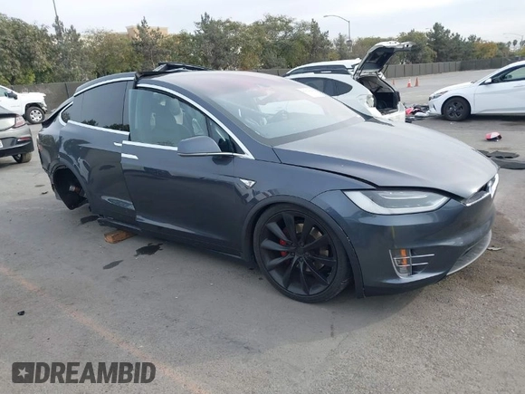 2016 Tesla Model X 70D with VIN 5YJXCAE27GF015175, listed as a IAAI auction lot 41074929 with 115,130 mi miles. Bid and sale history available at carsss.com. Image 1.