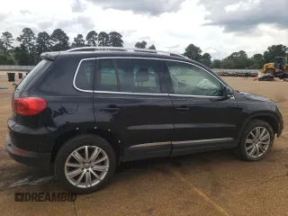 2014 Volkswagen Tiguan SEL with VIN WVGAV3AX5EW558929, listed as a Copart auction lot 71004684 with 125,628 mi miles and Clean title. Bid and sale history available at DreamBid. Image 3.
