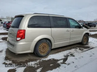 2014 Dodge Grand Caravan SE 30th Anniversary with VIN 2C4RDGBG8ER110502, listed as a Copart auction lot 45541875 with Not Provided miles and Salvage Title. Bid and sale history available at DreamBid. Image 3.