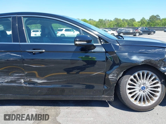 2016 Ford Fusion Titanium with VIN 3FA6P0K9XGR158234, listed as a IAAI auction lot 42043716 with 161,164 mi miles. Bid and sale history available at carsss.com. Image 17.