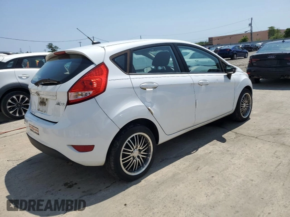 2012 Ford Fiesta SE z VIN 3FADP4EJ9CM148404, wystawiony jako Copart lot #59150695 z przebiegiem 84 705 mil mil oraz Czysty tytuł • Clean title. Historia ofert i sprzedaży dostępna na DreamBid. Obrazek 3.