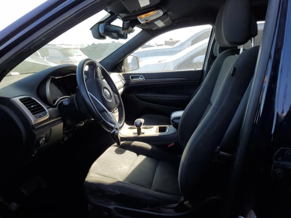 2015 Jeep Grand Cherokee Laredo with VIN 1C4RJFAG6FC893012, listed as a Copart auction lot 47705655 with 201,056 mi miles and Salvage Title. Bid and sale history available at carsss.com. Image 7.