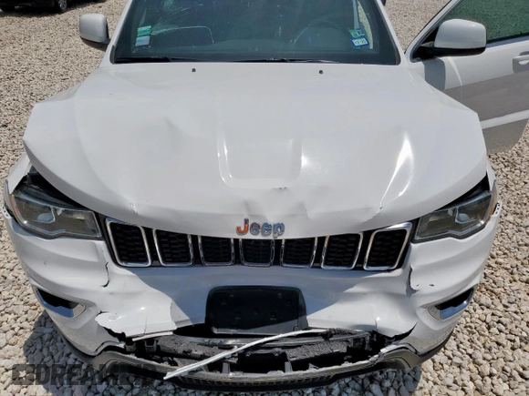 2021 Jeep Grand Cherokee Laredo E with VIN 1C4RJEAG7MC596709, listed as a Copart auction lot 57466875 with 56,164 mi miles and Salvage title. Bid and sale history available at DreamBid. Image 12.