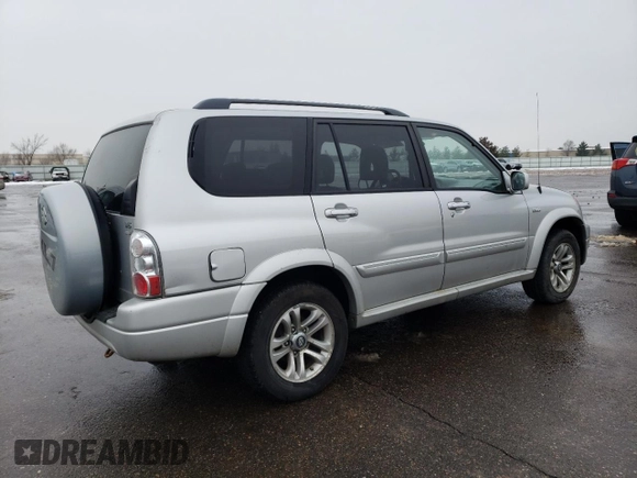 2005 Suzuki XL7 LX with VIN JS3TX92V054108383, listed as a Copart auction lot 85280414 with 128,594 mi miles and Salvage title. Bid and sale history available at DreamBid. Image 3.