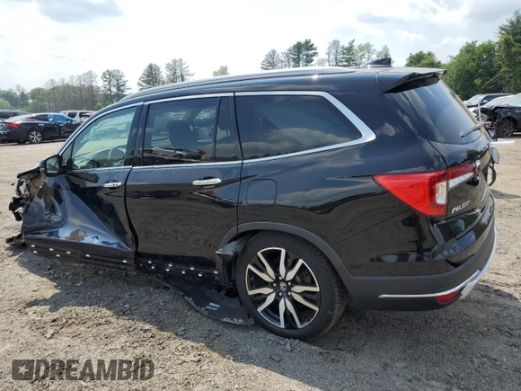 2020 Honda Pilot Touring 8-Passenger with VIN 5FNYF5H95LB021658, listed as a Copart auction lot 58878594 with 36,122 mi miles and Salvage Title. Bid and sale history available at DreamBid. Image 2.