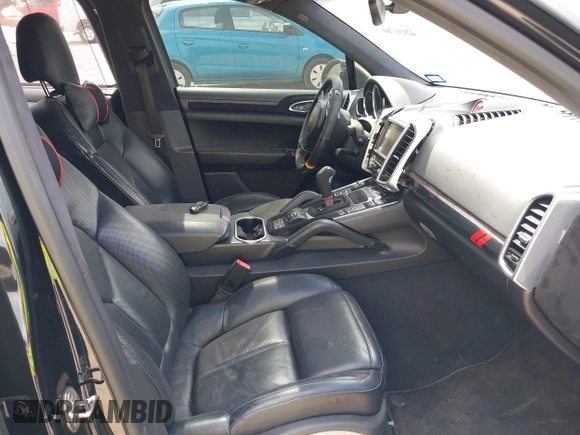 2014 Porsche Cayenne GTS with VIN WP1AD2A25ELA71350, listed as a IAAI auction lot 42031766 with 104,184 mi miles and . Bid and sale history available at DreamBid. Image 5.