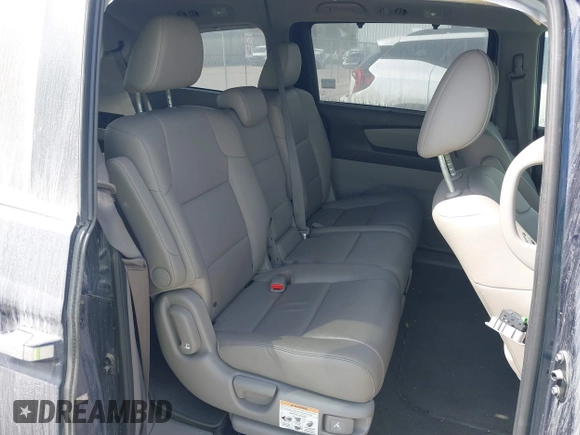 2015 Honda Odyssey EX-L z VIN 5FNRL5H65FB090177, wystawiony jako IAAI lot #41575419 z przebiegiem 128 582 mil mil oraz . Historia ofert i sprzedaży dostępna na DreamBid. Obrazek 8.