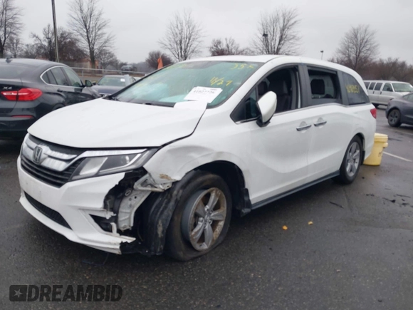 2020 Honda Odyssey EX-L with VIN 5FNRL6H78LB031411, listed as a IAAI auction lot 41027726 with 55,586 mi miles. Bid and sale history available at carsss.com. Image 2.