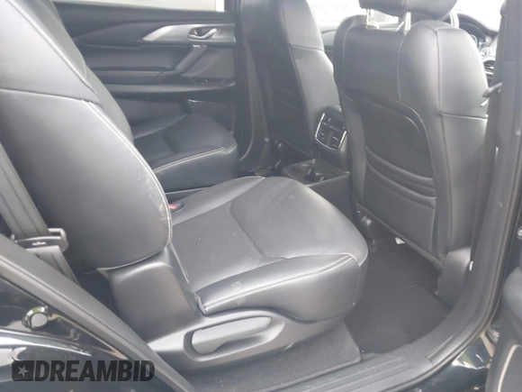 2023 Mazda CX-9 Grand Touring with VIN JM3TCBDY2P0632239, listed as a IAAI auction lot 41543302 with 56,603 mi miles and . Bid and sale history available at carsss.com. Image 8.