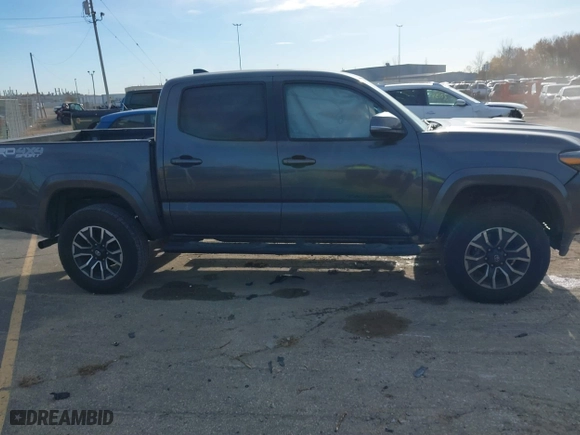 2023 Toyota Tacoma 4WD SR with VIN 3TMCZ5AN8PM574766, listed as a IAAI auction lot 40663003 with 43,978 mi miles. Bid and sale history available at carsss.com. Image 14.