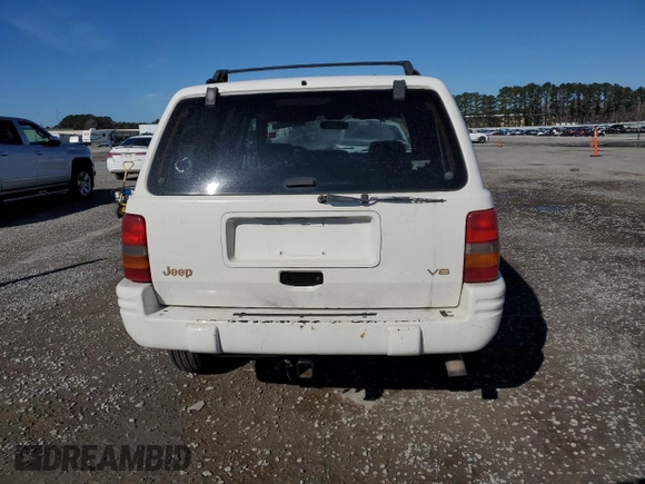 1998 Jeep Grand Cherokee Limited with VIN 1J4GZ78Y0WC307578, listed as a Copart auction lot 45272765 with 328,264 mi miles and Salvage title. Bid and sale history available at DreamBid. Image 6.