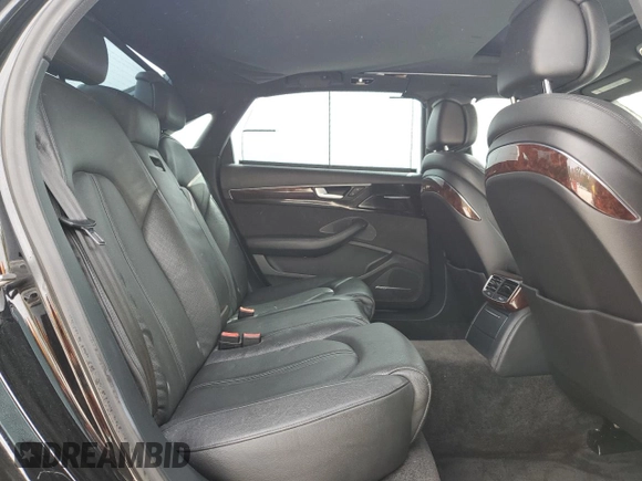 2014 Audi A8 3.0T z VIN WAURGAFD2EN002567, wystawiony jako Copart lot #48188395 z przebiegiem 159 477 mil mil oraz Szkody całkowita. Historia ofert i sprzedaży dostępna na DreamBid. Obrazek 10.