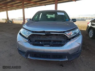2019 Honda CR-V LX with VIN 2HKRW5H34KH420447, listed as a IAAI auction lot 41616151 with 104,373 mi miles. Bid and sale history available at carsss.com. Image 12.