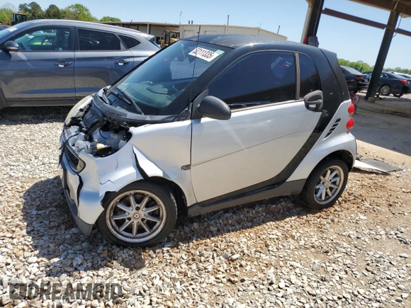 2009 Smart fortwo Pure with VIN WMEEJ31X49K224990, listed as a Copart auction lot 52111335 with 72,317 mi miles and Salvage Title. Bid and sale history available at carsss.com. Image 1.