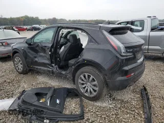 2023 Cadillac XT4 FWD Sport with VIN 1GYFZER48PF155576, listed as a Copart auction lot 77071994 with 47,539 mi miles and Salvage title. Bid and sale history available at DreamBid. Image 2.