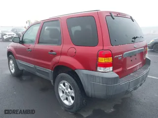 2007 Ford Escape XLT with VIN 1FMCU03147KC00069, listed as a IAAI auction lot 41343434 with 209,220 mi miles. Bid and sale history available at carsss.com. Image 3.